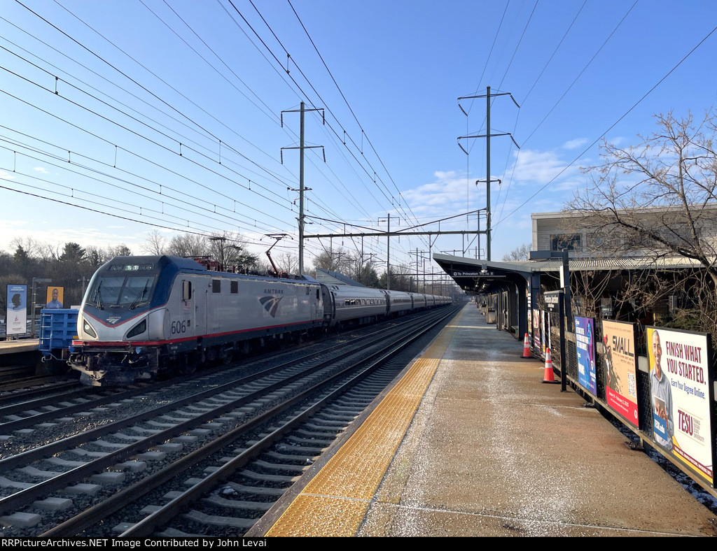 Eastbound Amtrak Northeast Regional Train # 162 slicing by with ACS-64 # 606 on the point